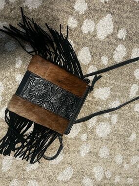 Fringed Brown Hair-on-Hide Crossbody Bag with Tooled Black Leather Accent